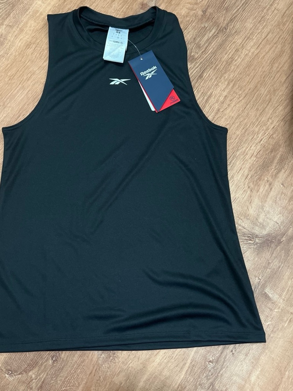 Reebok woman’s Black Swim Rash Tank with White Logo